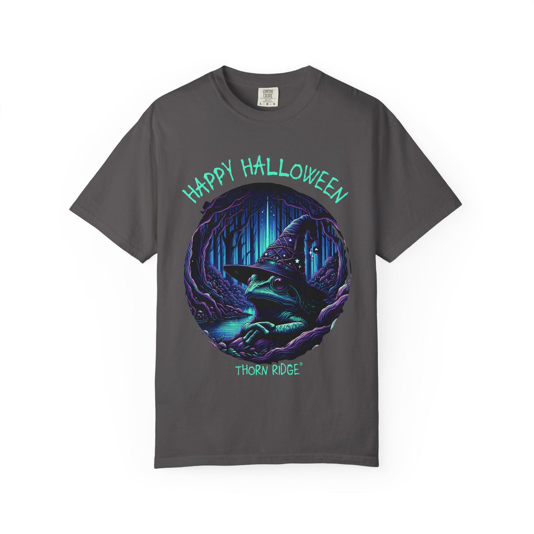 Happy Halloween from The Frog Witch labeled Thorn Ridge. Frog with a witches hat sitting by a dark stream in a wicked forest.