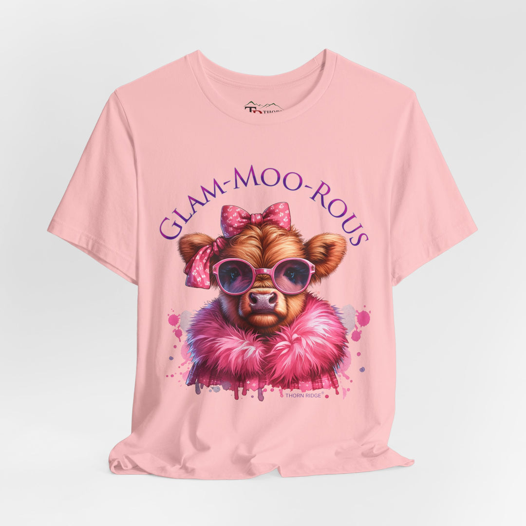 "Glam-Moo-Rous" Graphic Tee with a  Cow in Pink with pink sunglasses and pink bows on her head and a pink boa around her neck. Labeled Thorn Ridge®