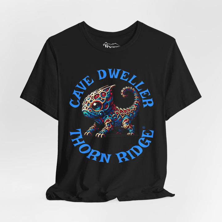 Cave Dweller funny lizard creature graphic tee labeled Thorn Ridge®