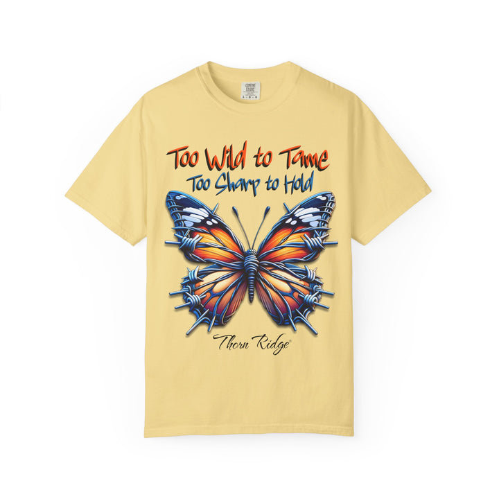 Too Wild To Tame Too Sharp To Hold Graphic Tee with a butterfly with barbed wire wings labeled Thorn Ridge.