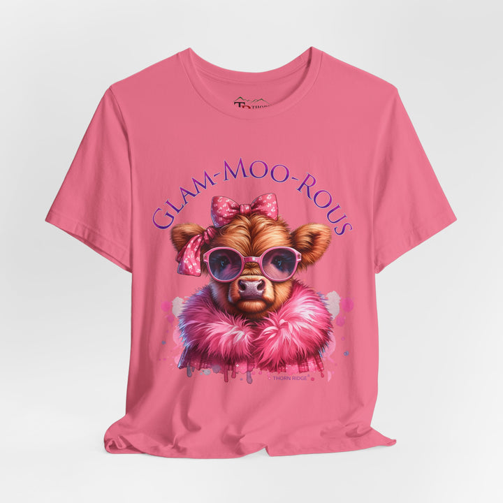 "Glam-Moo-Rous" Graphic Tee with a  Cow in Pink with pink sunglasses and pink bows on her head and a pink boa around her neck. Labeled Thorn Ridge®