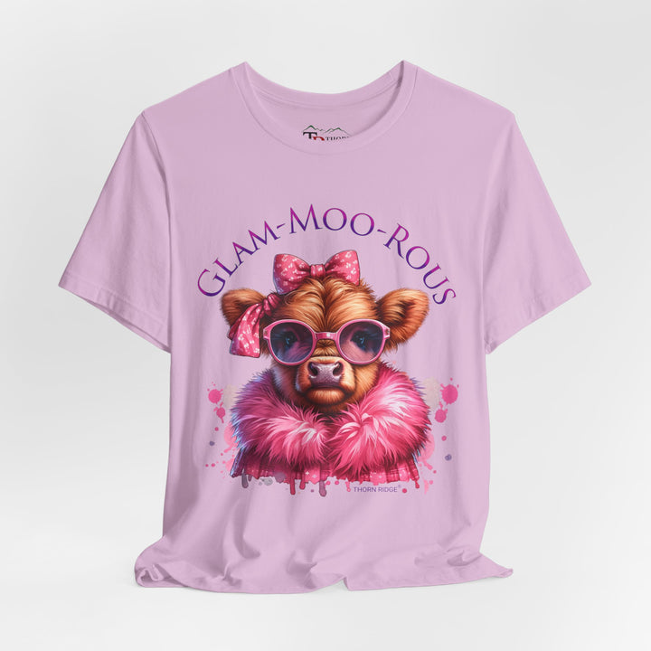 "Glam-Moo-Rous" Graphic Tee with a  Cow in Pink with pink sunglasses and pink bows on her head and a pink boa around her neck. Labeled Thorn Ridge®