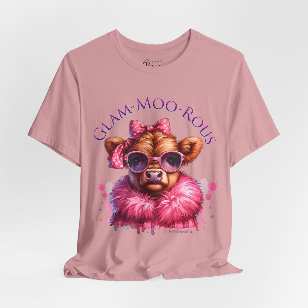 "Glam-Moo-Rous" Graphic Tee with a  Cow in Pink with pink sunglasses and pink bows on her head and a pink boa around her neck. Labeled Thorn Ridge®