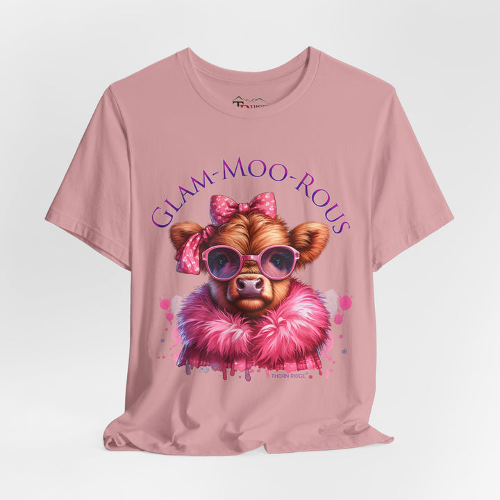"Glam-Moo-Rous" Graphic Tee with a  Cow in Pink with pink sunglasses and pink bows on her head and a pink boa around her neck. Labeled Thorn Ridge®