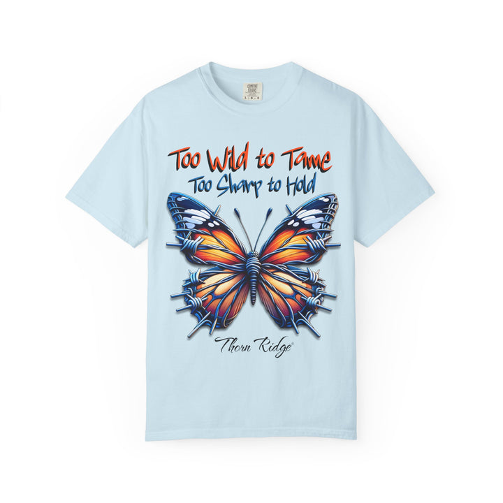 Too Wild To Tame Too Sharp To Hold Graphic Tee with a butterfly with barbed wire wings labeled Thorn Ridge.