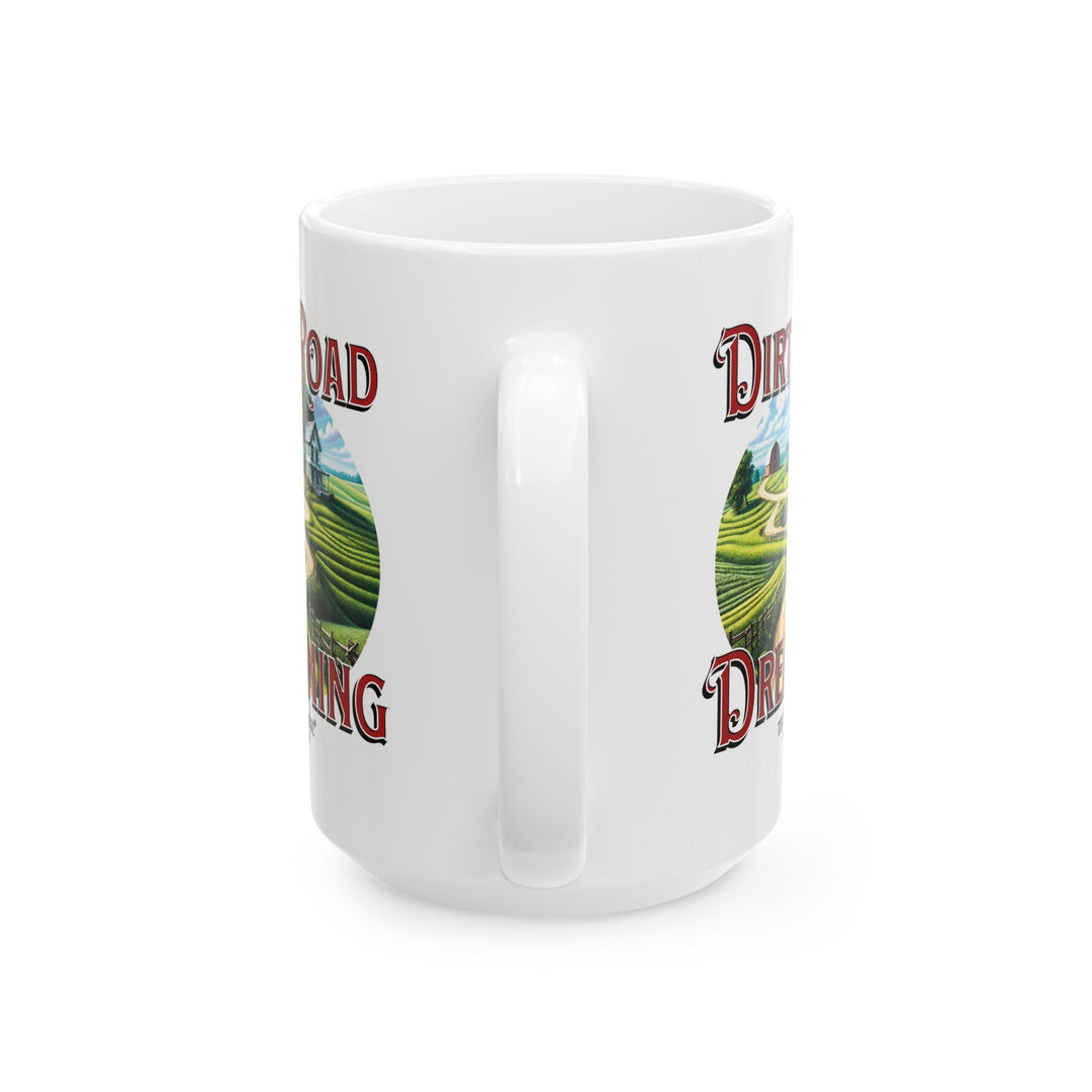 White mug with 'Dirt Road Dreaming' design featuring a rural scene of a farmhouse and feilds by Thorn Ridge®