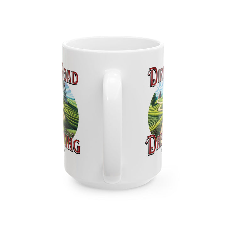 White mug with 'Dirt Road Dreaming' design featuring a rural scene of a farmhouse and feilds by Thorn Ridge®