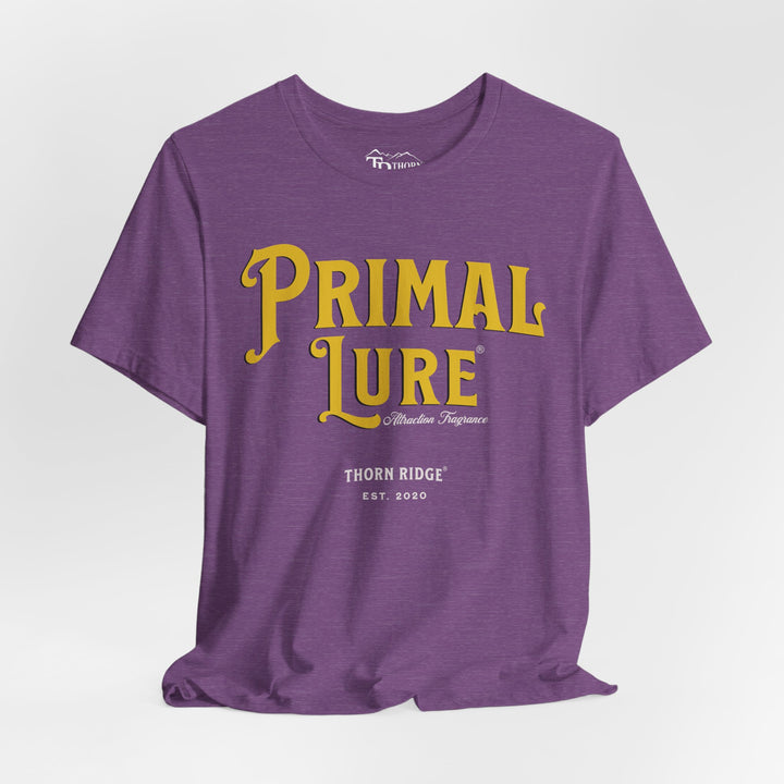 t-shirt with the text 'PRIMAL LURE' in bold yellow letters and 'THORN RIDGE EST. 2000' in smaller text below it.