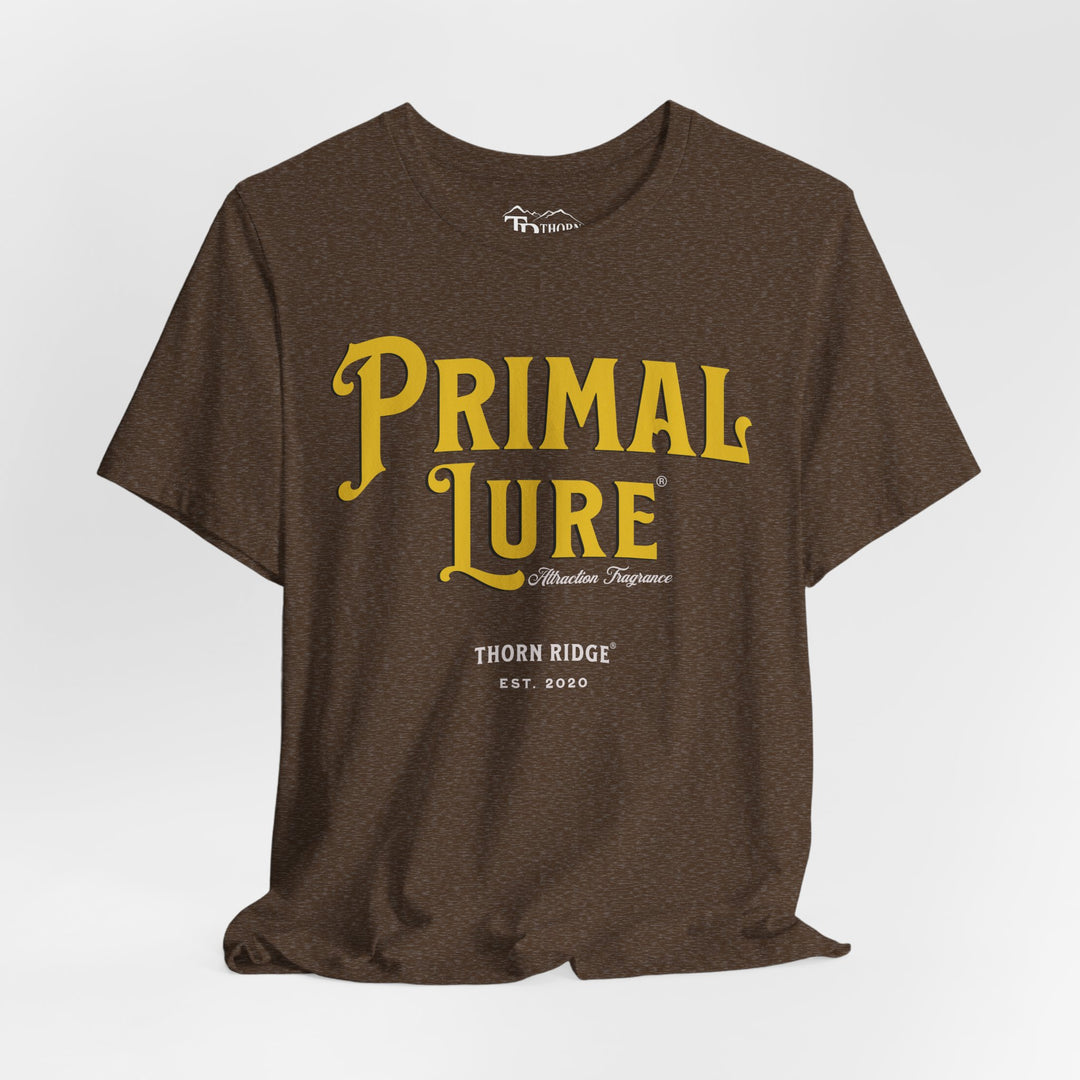 t-shirt with the text 'PRIMAL LURE' in bold yellow letters and 'THORN RIDGE EST. 2000' in smaller text below it.