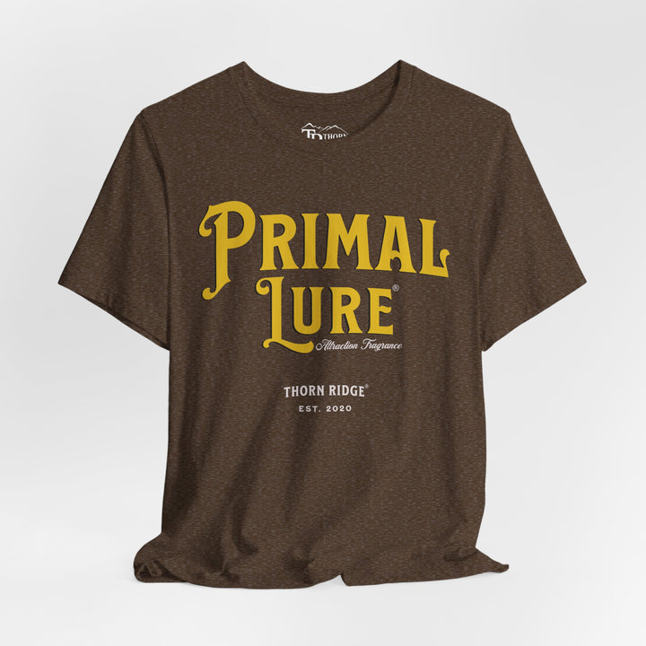 t-shirt with the text 'PRIMAL LURE' in bold yellow letters and 'THORN RIDGE EST. 2000' in smaller text below it.