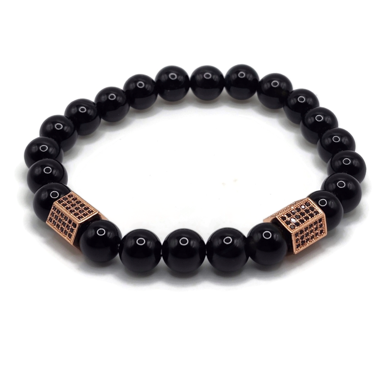 Black agate beaded elastic bracelet with brass accents.