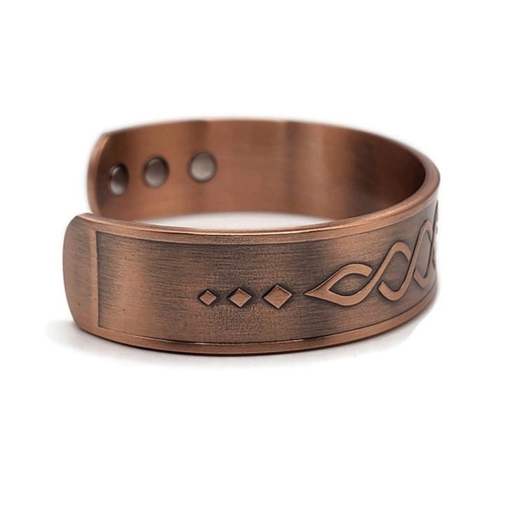 Adjustable magnetic copper tree of life bracelet.