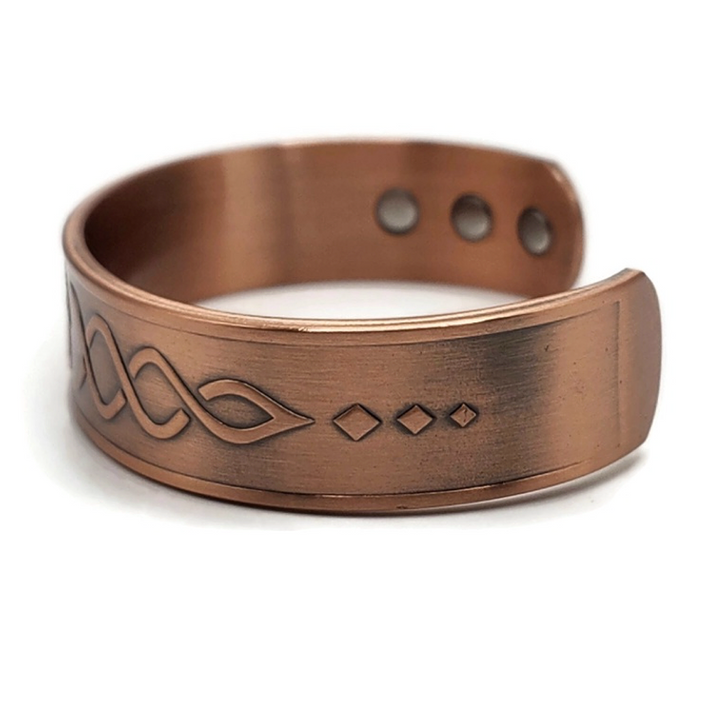 Adjustable magnetic copper tree of life bracelet.