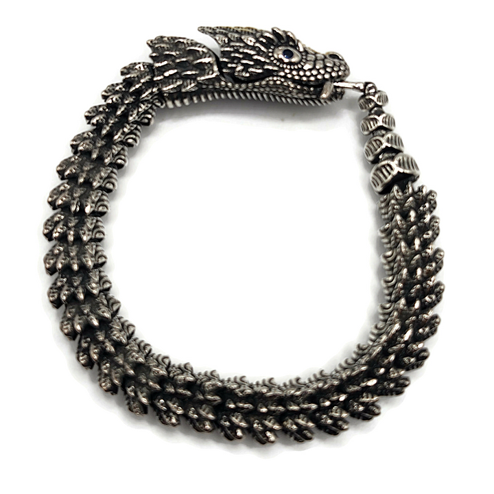 Dragon snake style metal alloy bracelet in silver and gold.