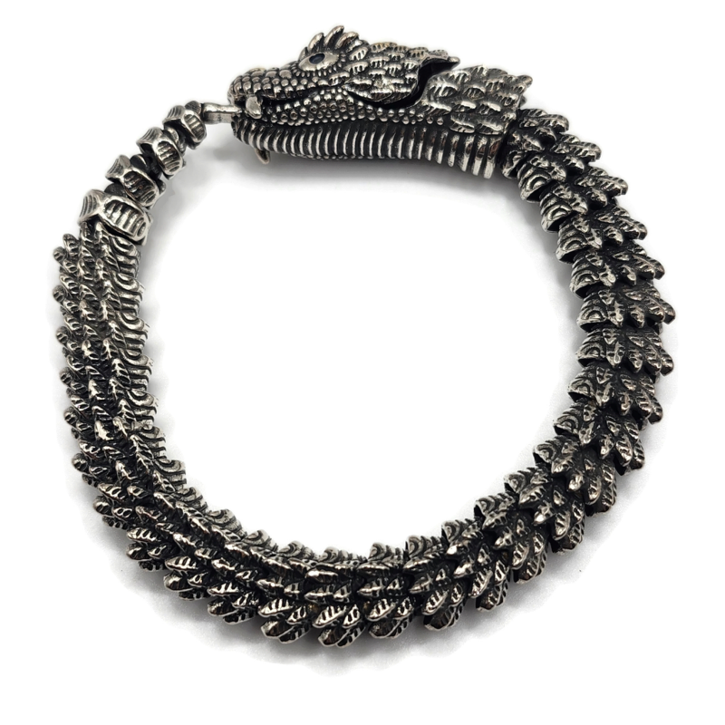 Dragon snake style metal alloy bracelet in silver and gold.