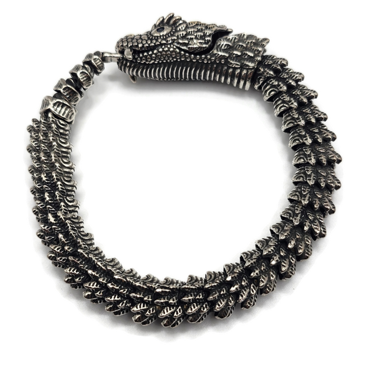 Dragon snake style metal alloy bracelet in silver and gold.