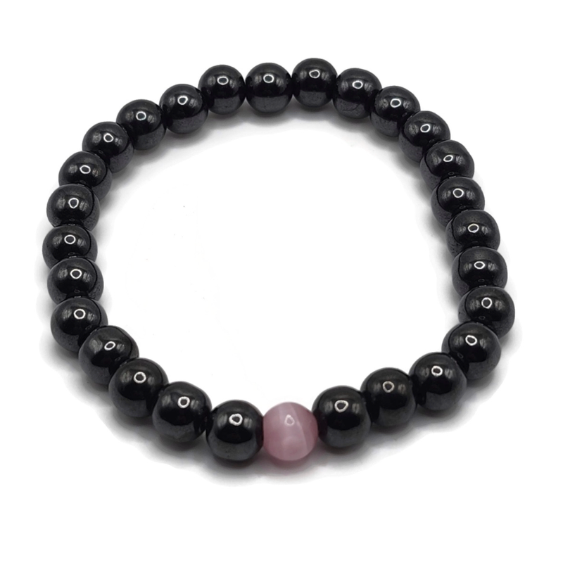 Magnetic bracelet with a pink gemstone.