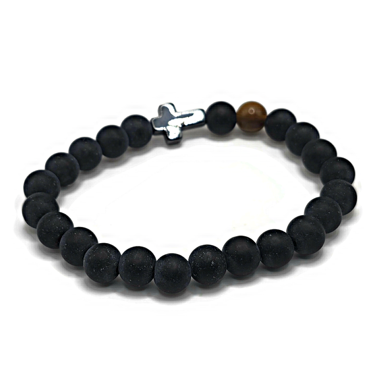 cross bracelet made of black agate and features a tiger eye gemstone.