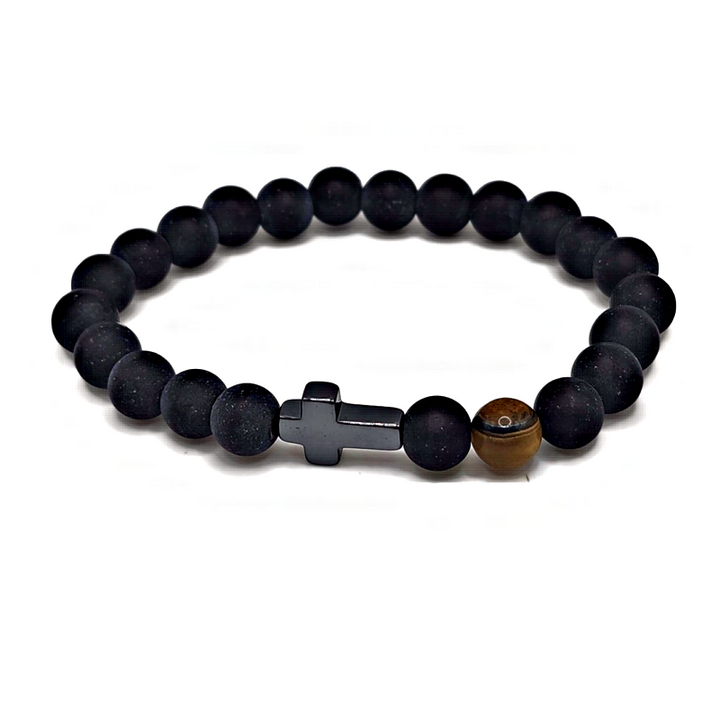 cross bracelet made of black agate and features a tiger eye gemstone.