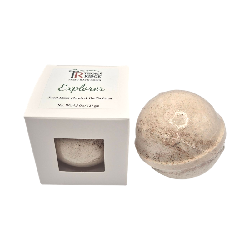Explorer bath bomb front with box packaging.
