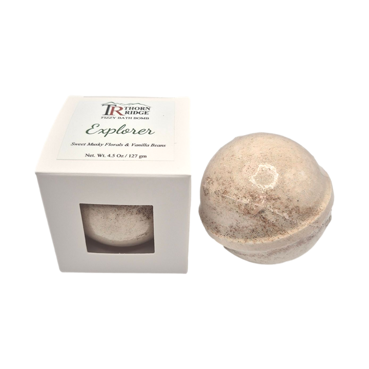 Explorer bath bomb front with box packaging.
