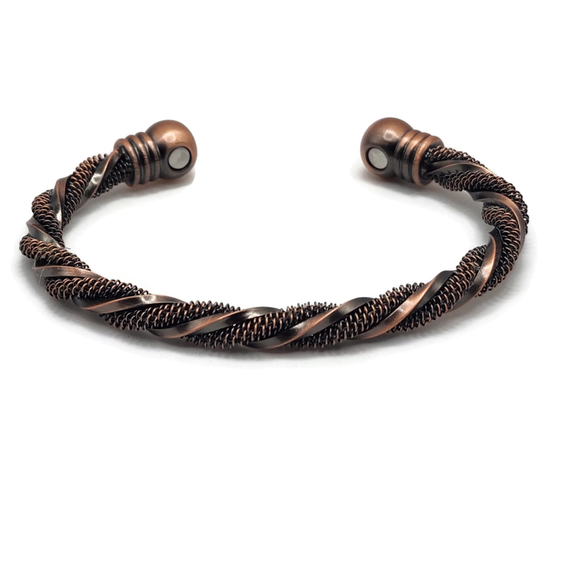Brass twisted bangle bracelet with a manget on each end. One section of brass is textured and the other is smooth.