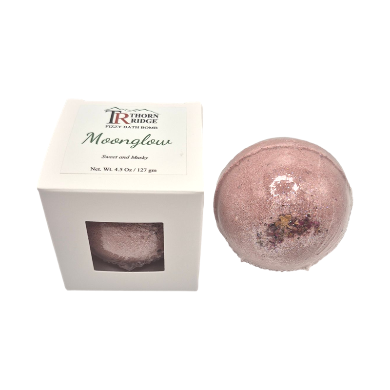 Moonglow bath bomb front with box packaging.