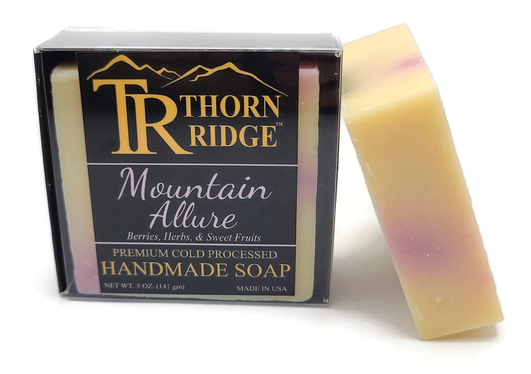 Packaging of Thorn Ridge soap labeled "Mountain Allure," described as berries, herbs, sweet fruits, premium cold processed, handmade, 5 oz. Made in USA.