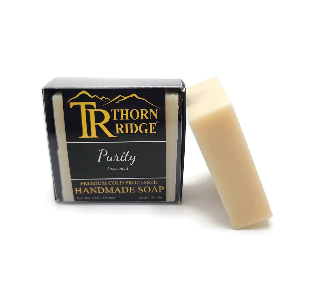 Packaging of Thorn Ridge soap labeled "Purity," described as unscented, premium cold processed, handmade, 5 oz. Made in USA.
