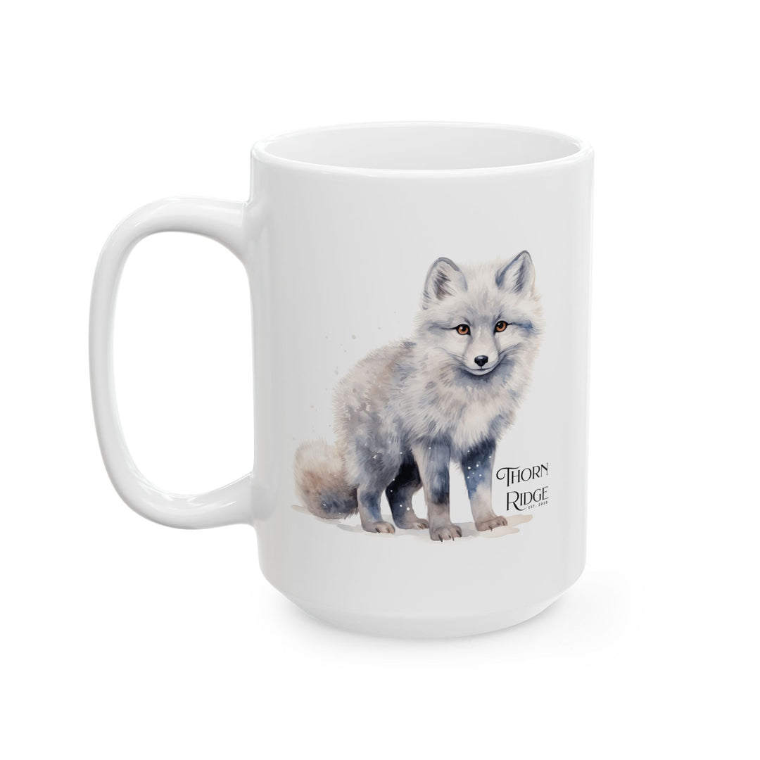 White mug with a graphic of a standing artic fox and 'Thorn Ridge' text on a white background