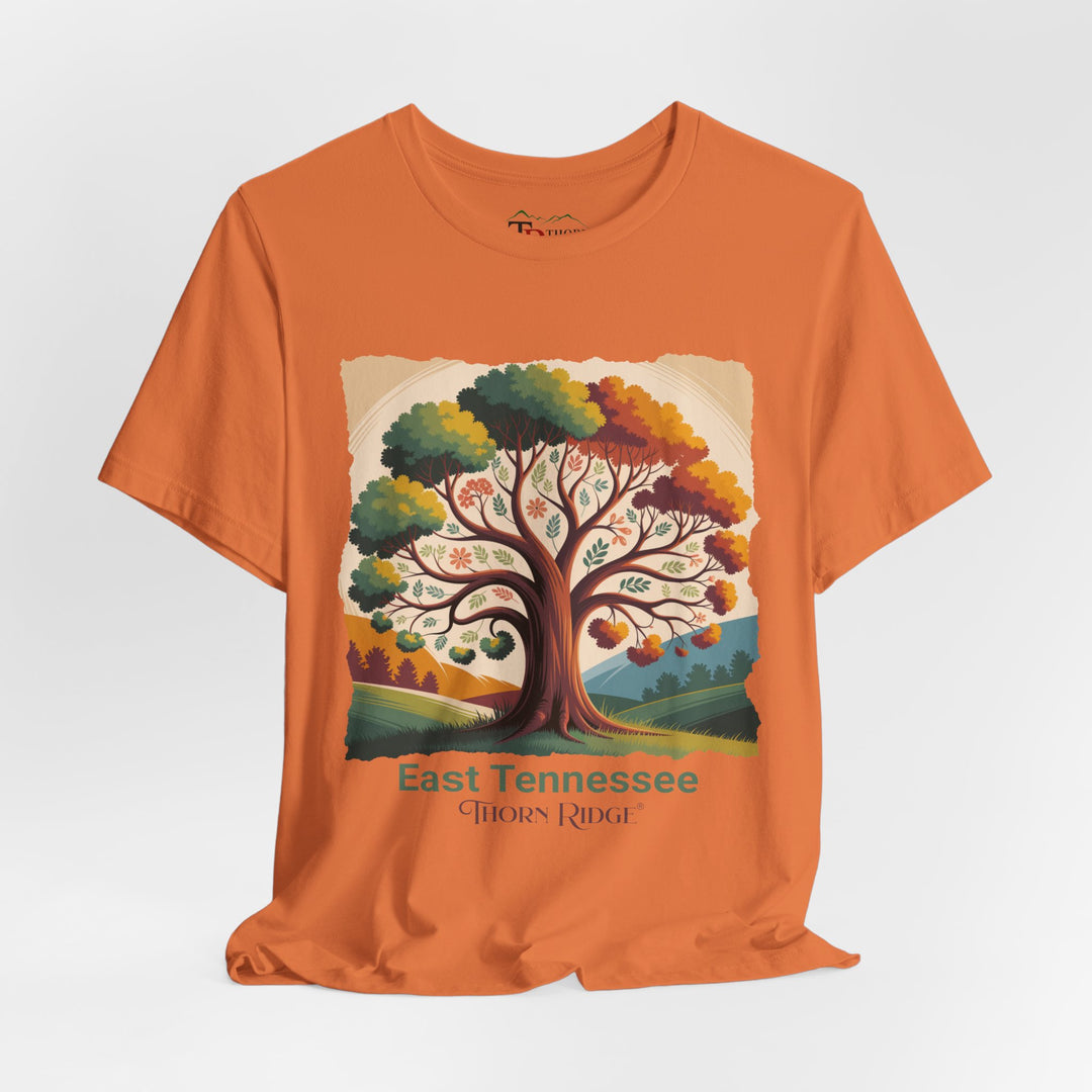 t-shirt with a colorful tree design and 'East Tennessee Thorn Ridge' text showing leaves changing during the fall of the year. 