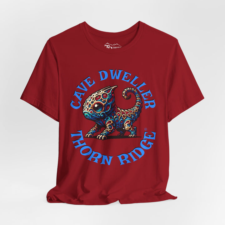 Cave Dweller funny lizard creature graphic tee labeled Thorn Ridge®