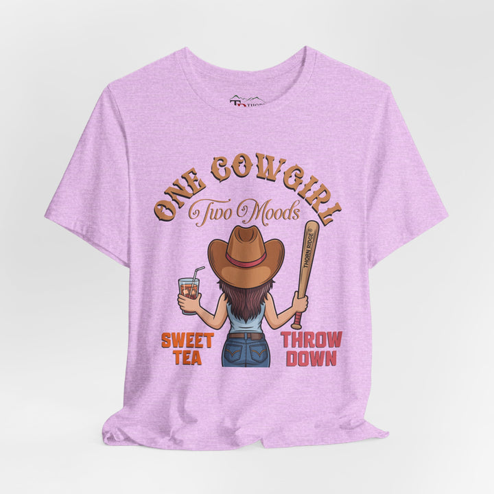 t-shirt with a graphic of a cowgirl holding a drink and a bat, with text 'One Cowgirl Two Moods Sweet Tea Throw Down' labeled Thorn Ridge®