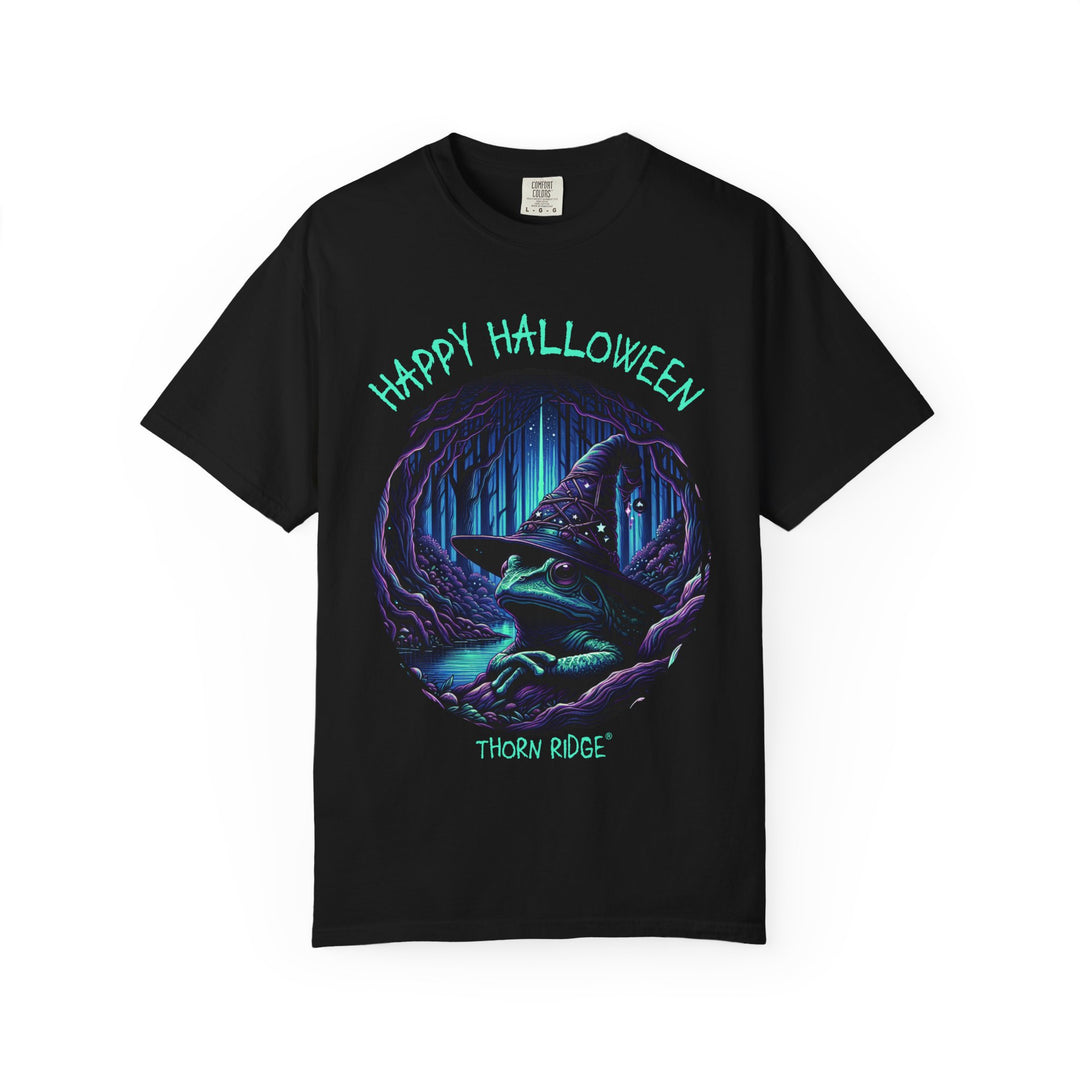 Happy Halloween from The Frog Witch labeled Thorn Ridge. Frog with a witches hat sitting by a dark stream in a wicked forest. 