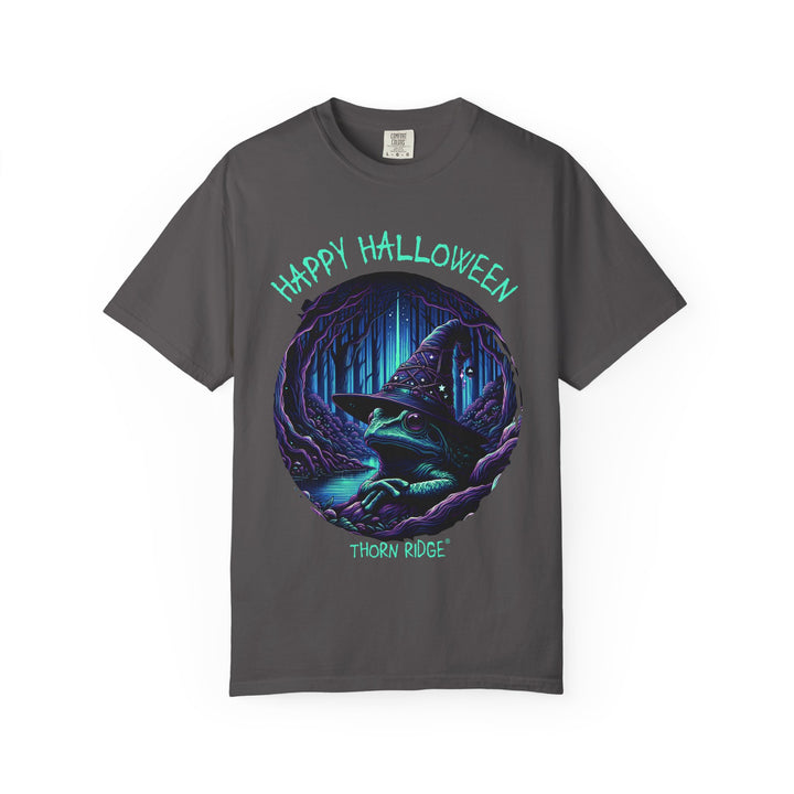 Happy Halloween from The Frog Witch labeled Thorn Ridge. Frog with a witches hat sitting by a dark stream in a wicked forest. 