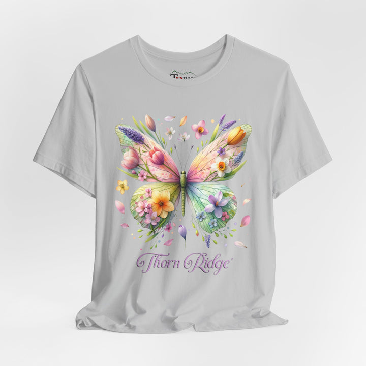Floral butterfly tee in pastel colors labeled Thorn Ridge®