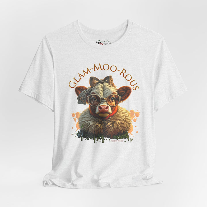 "Glam-Moo-Rous" Graphic Tee with a  Cow in brown tones with sunglasses and bows on her head and a boa around her neck. Labeled Thorn Ridge®