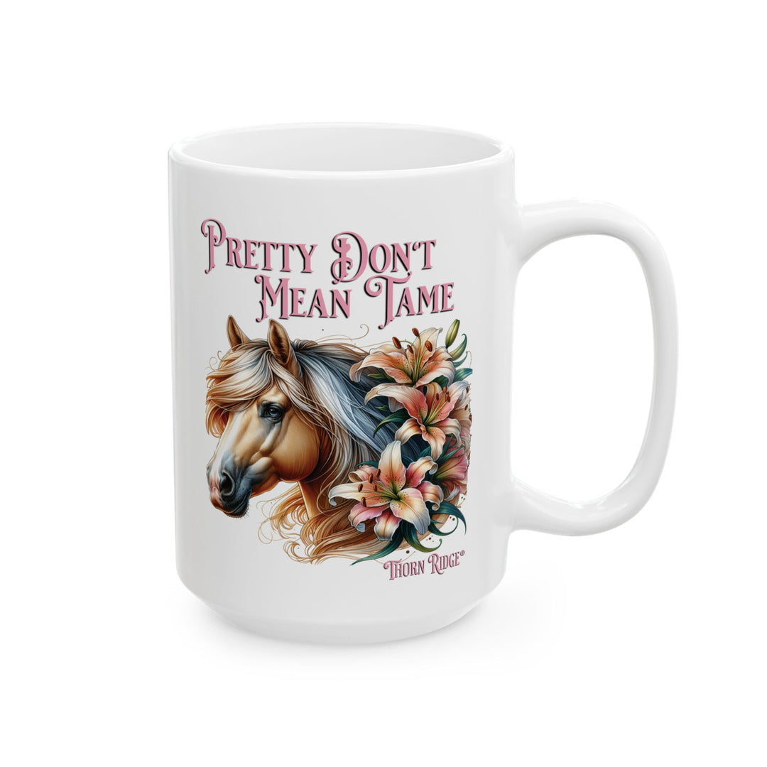 White mug with a horse and floral design, featuring the text 'Pretty Don't Mean Tame' by Thorn Ridge®