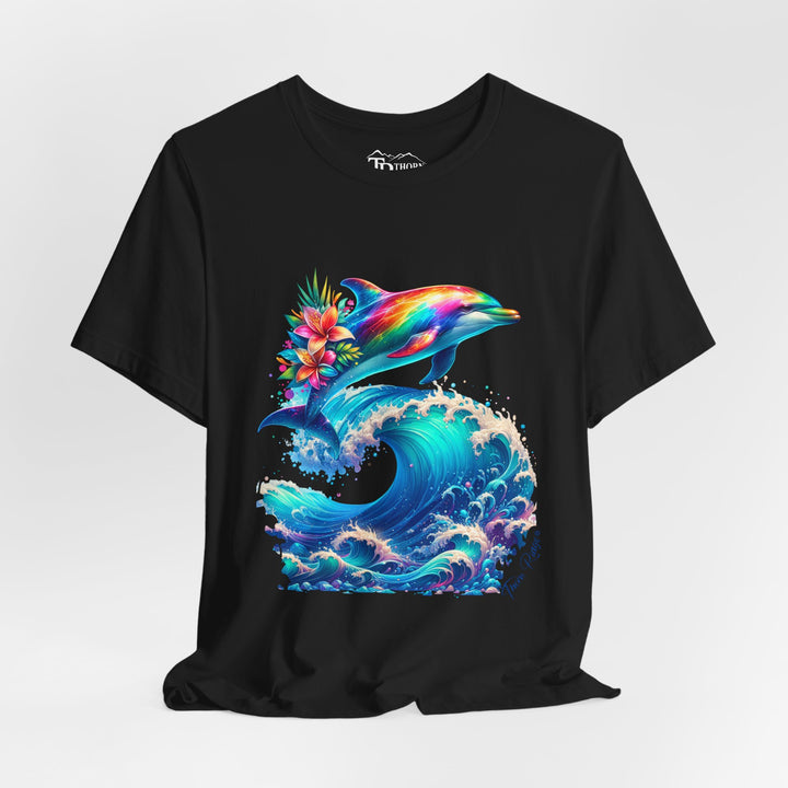 Colorful rainbow dolphin with flowers on its back near its tail jumping over a curling ocean wave. Labeled Thorn Ridge®. 