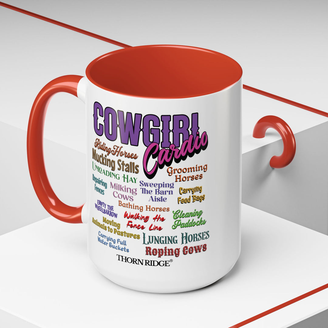Mug with 'Cowgirl Cardio' text and red handle on a white background