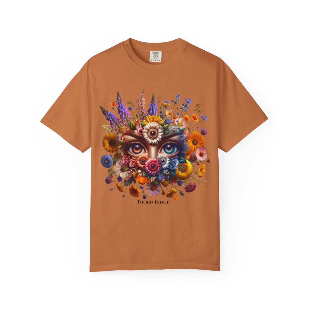 t-shirt with a colorful floral design and eyes in the center that seem like they're watching you. Branded Thorn Ridge®.