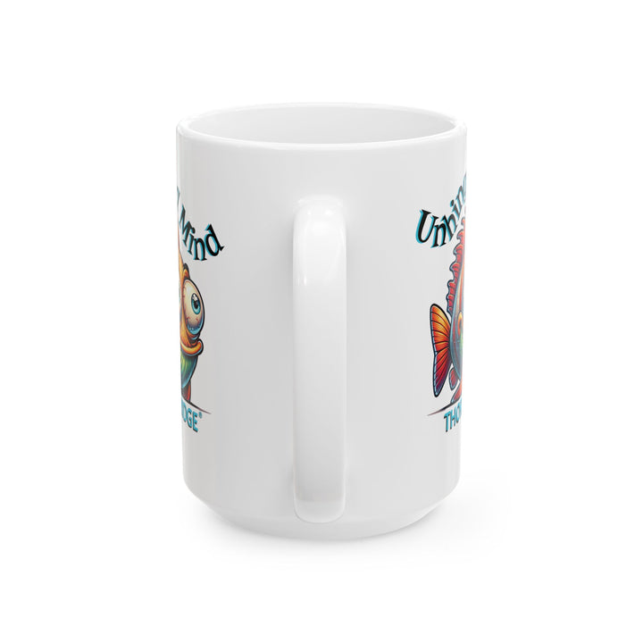 White mug with a colorful fish graphic and Unhinged Mind by Thorn Ridge®