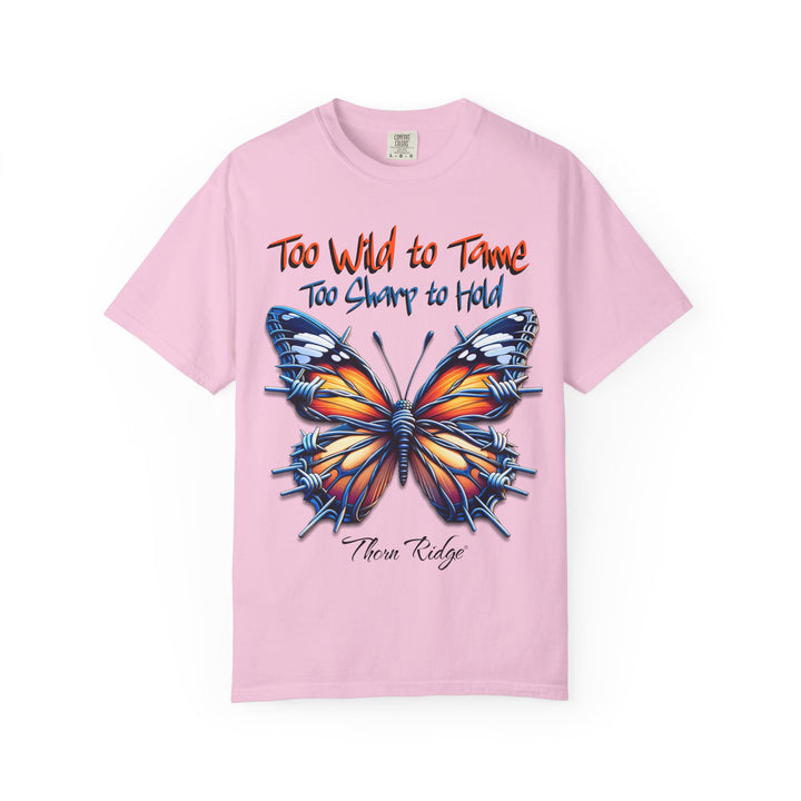 Too Wild To Tame Too Sharp To Hold Graphic Tee with a butterfly with barbed wire wings labeled Thorn Ridge. 