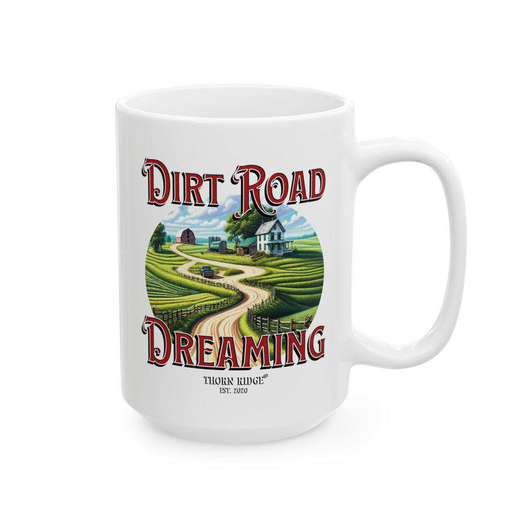 White mug with 'Dirt Road Dreaming' design featuring a rural scene of a farmhouse and feilds by Thorn Ridge®