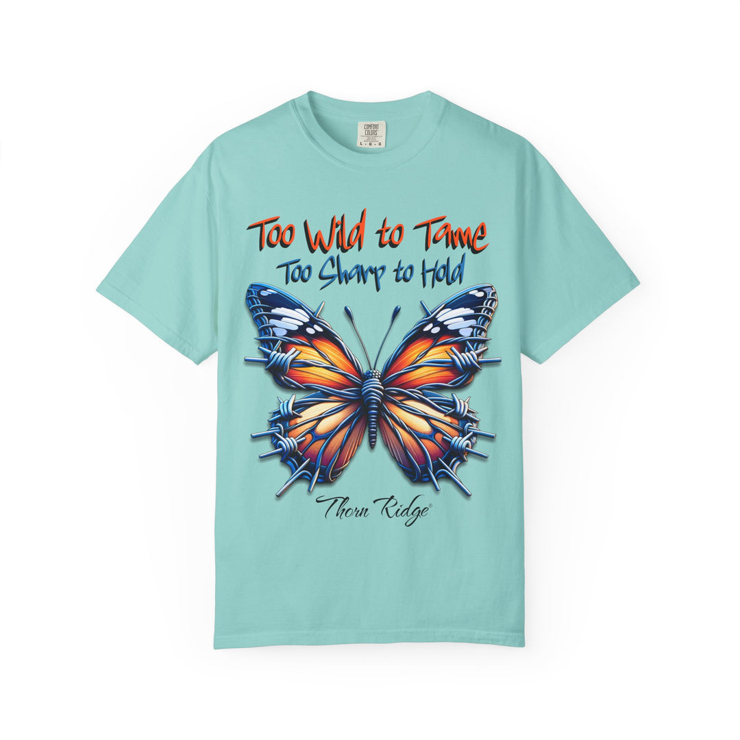 Too Wild To Tame Too Sharp To Hold Graphic Tee with a butterfly with barbed wire wings labeled Thorn Ridge. 
