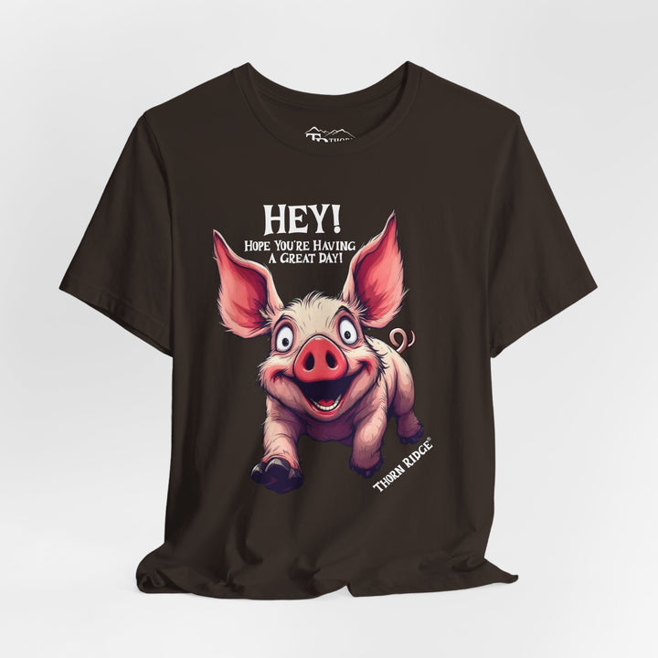 pig running toward you with ears flapping in the wind and the text Hey! Hope you're having a great day and labeled Thorn Ridge®