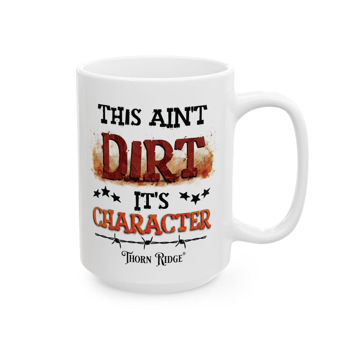 White mug with text 'This ain't dirt, it's character' and Thorn Ridge logo on a white background