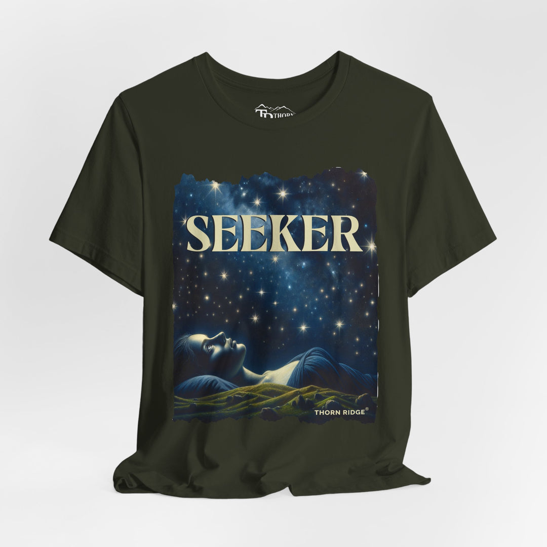 t-shirt labeled Seeker with the graphic of a woman laying on her back looking at the stars labeled Thorn Ridge®