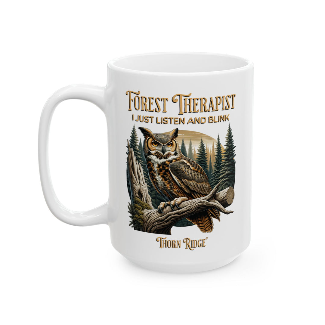 White mug with an owl design and text Forest Therapist by Thorn Ridge®