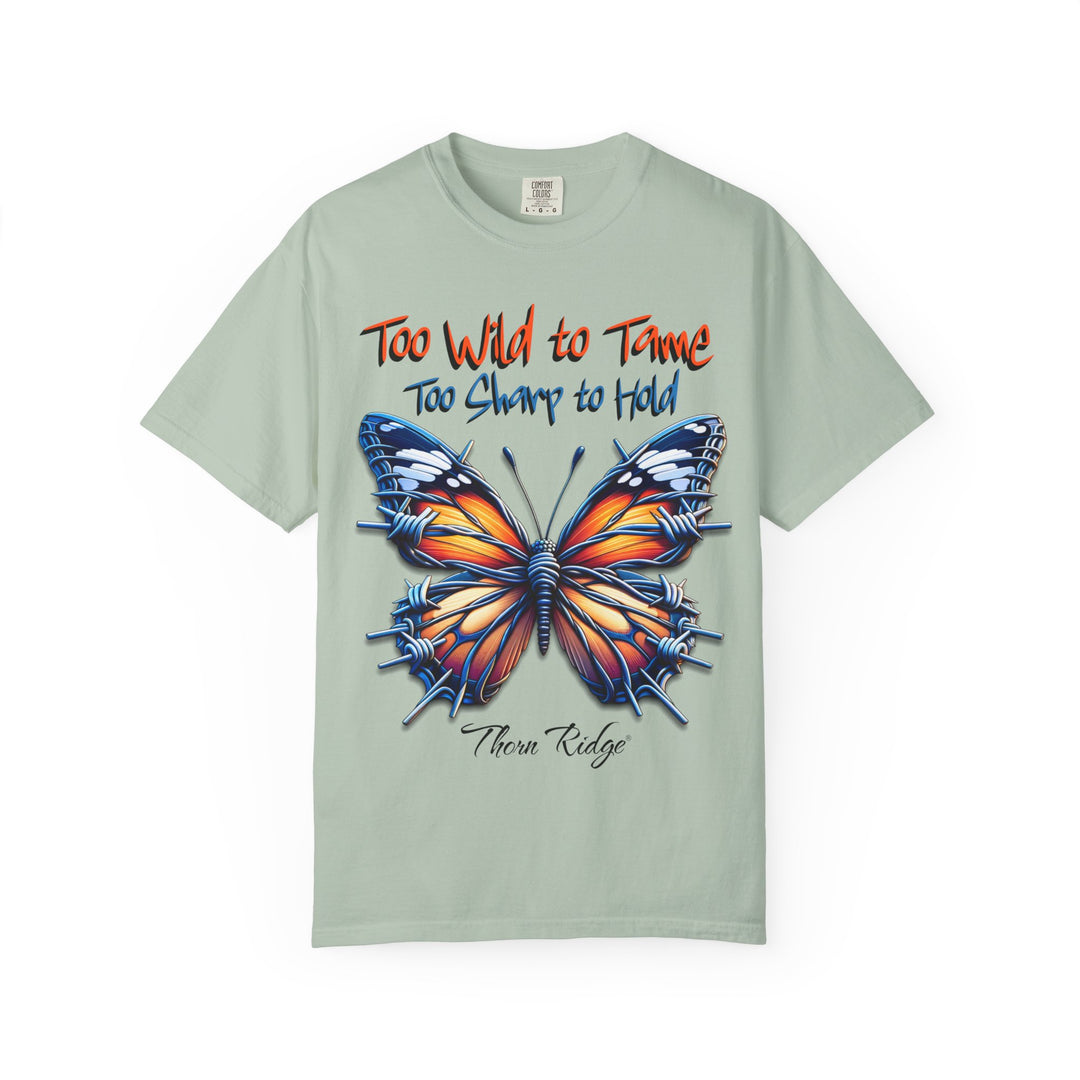 Too Wild To Tame Too Sharp To Hold Graphic Tee with a butterfly with barbed wire wings labeled Thorn Ridge. 